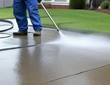 Pressure washing a concrete surface